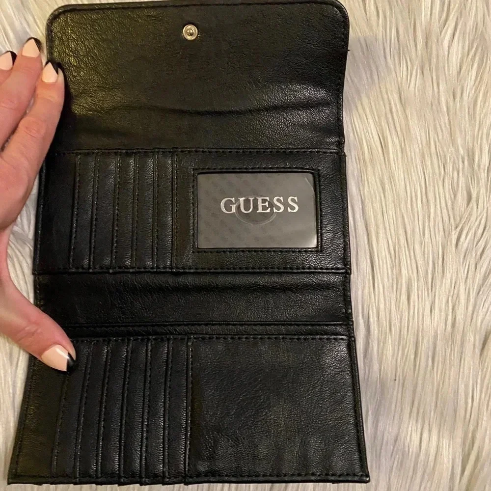 🆕 Guess Black with Tan Accent Buckle on Front Wallet